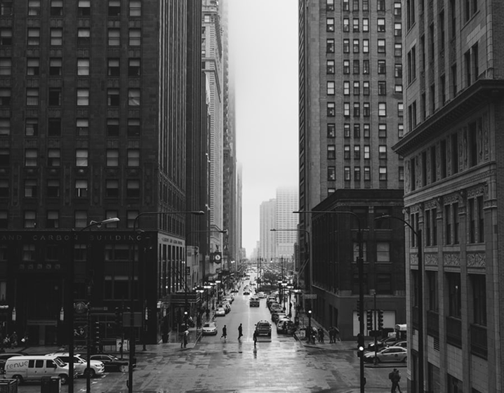 busy street with tall buildings